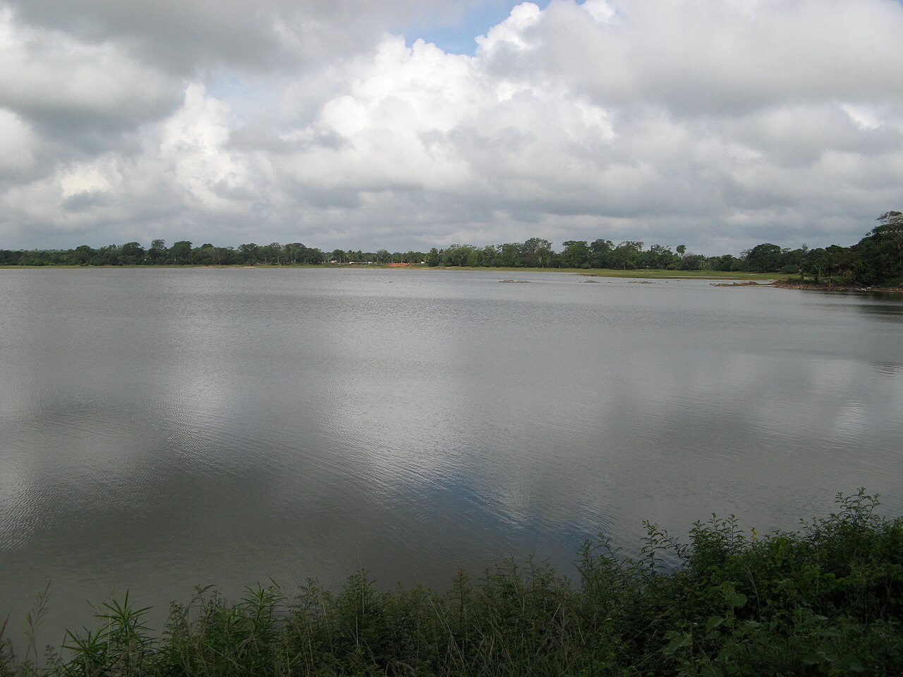Real photo of Tissa Wewa reservoir embankment and water